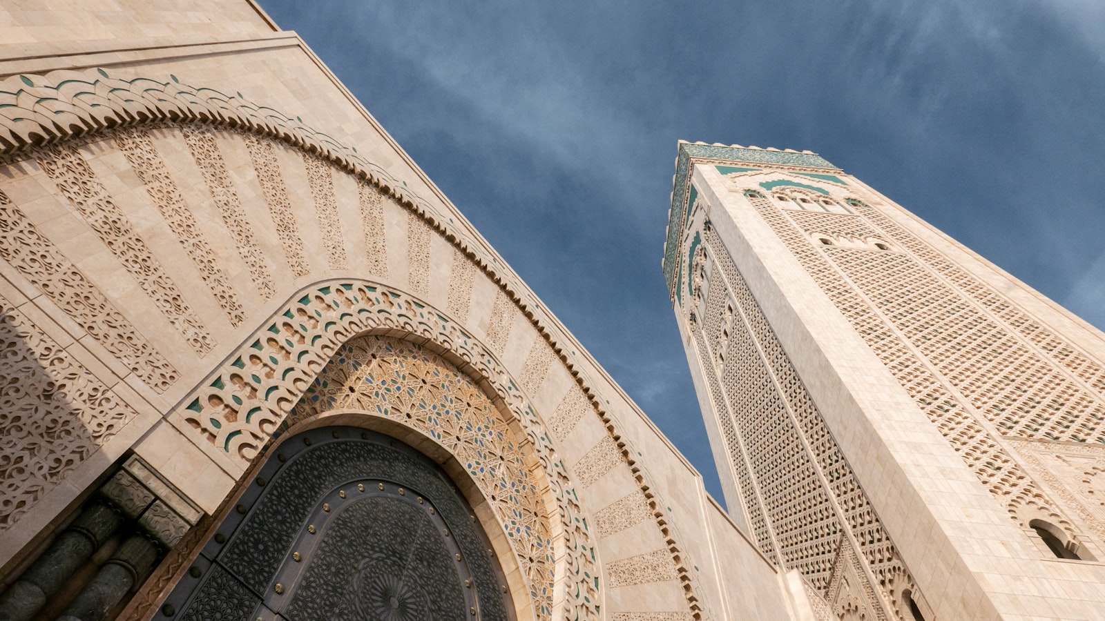 bottom view photography of buildings under blue sky