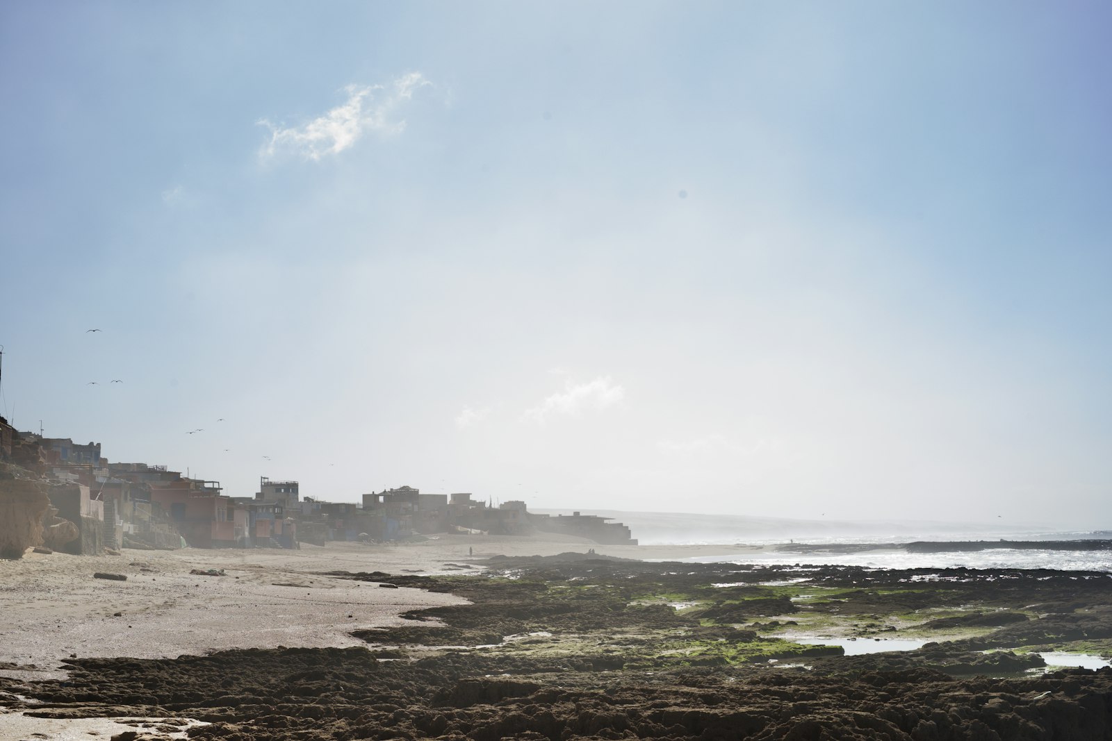 a beach with buildings on it