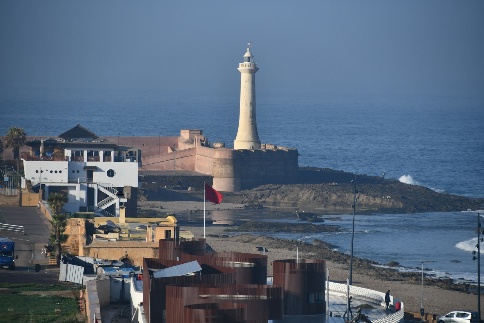a view of a lighthouse from a distance