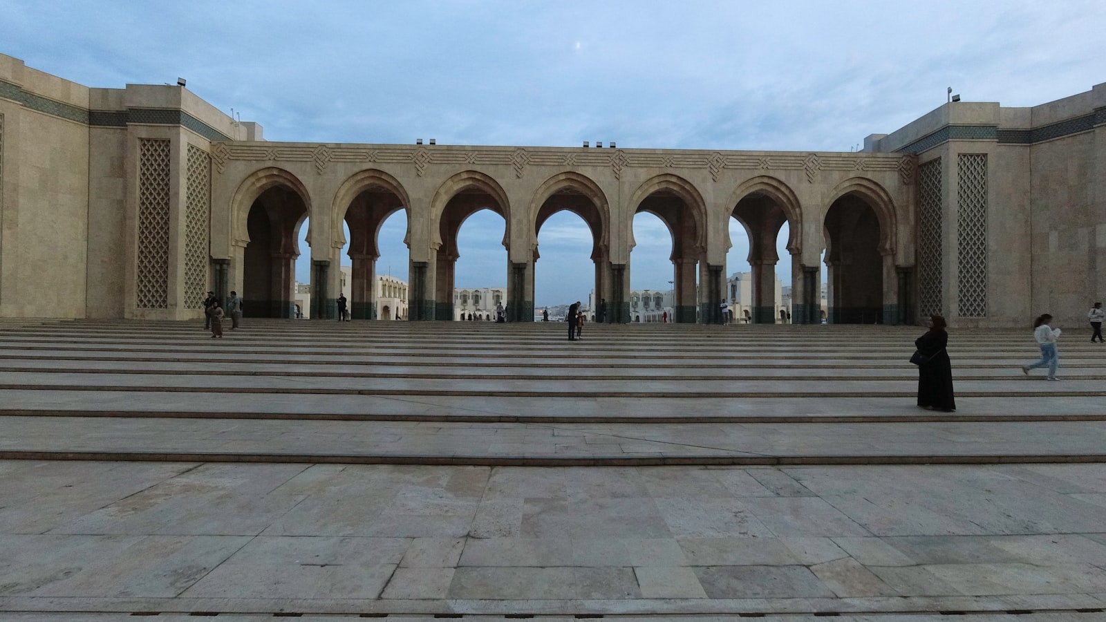 a large stone building with pillars